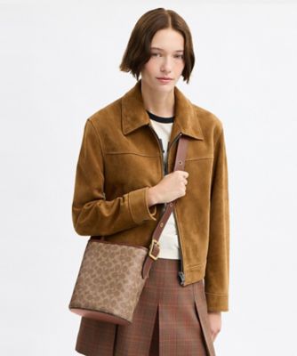 ブリーカー バケット バッグ 21・シグネチャー キャンバス | COACH
